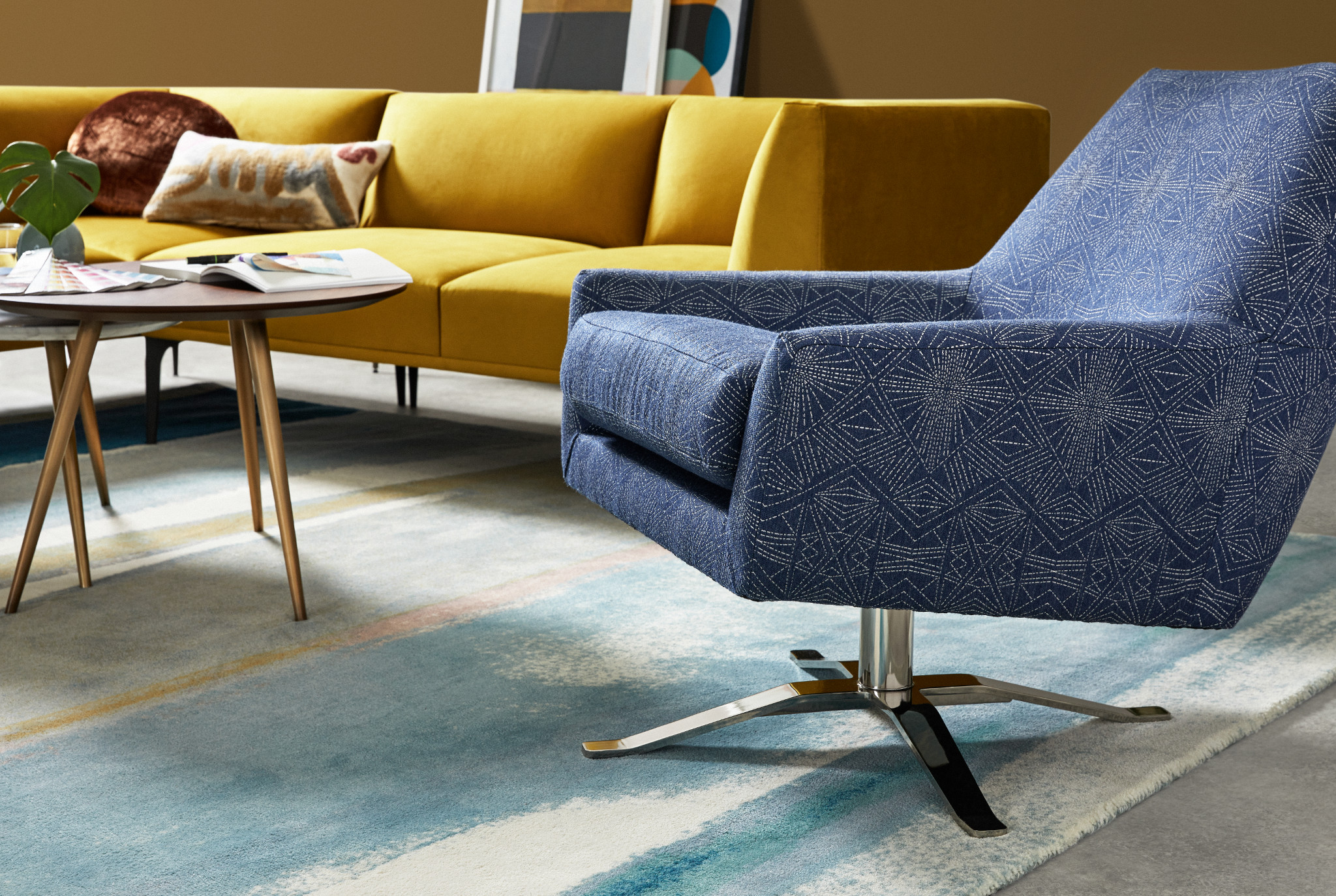 west elm Work Lucas Swivel Chair a streamlined look, while a wide seat and reclined pitch make it a comfortable spot to sit during impromptu meetings.